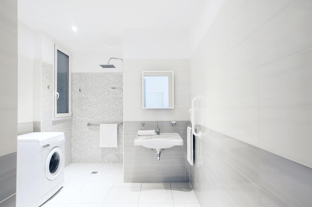 Vuelle Residence Apartments Capo dʼOrlando Zimmer foto