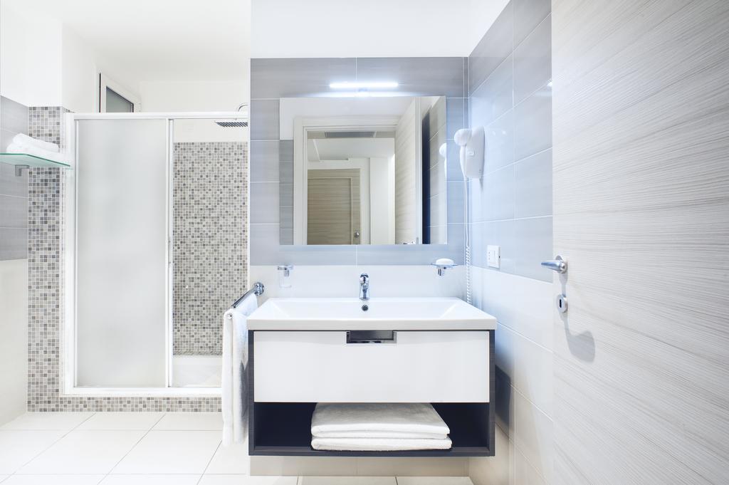 Vuelle Residence Apartments Capo dʼOrlando Zimmer foto