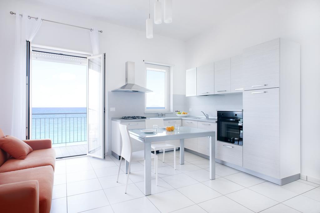 Vuelle Residence Apartments Capo dʼOrlando Zimmer foto